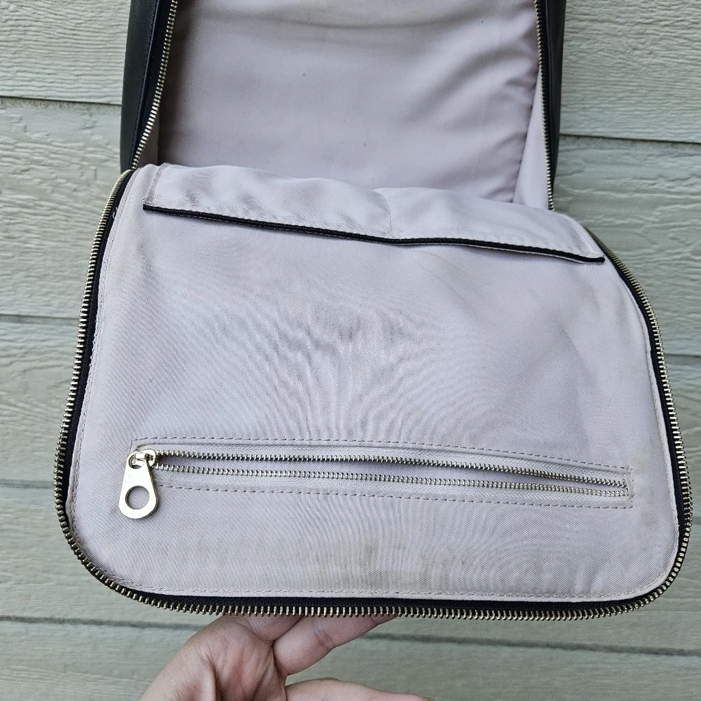 Calpak Kaya black faux leather laptop travel backpack